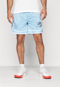 Light blue mesh basketball shorts with white accents, featuring LA logo and "World Series 1988" graphic on the left side.