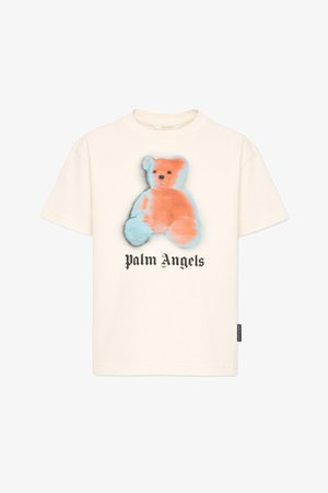 Biały t-shirt z krótkim rękawem, na którym znajduje się grafika niebieskiego i pomarańczowego misia pluszowego nad napisem „Palm Angels” czcionką gotycką w czarnym kolorze.