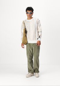 Carlo Colucci Trui - beige