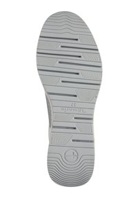 Suola di scarpa grigia chiara con motivi testurizzati e scanalature per la presa. Presenta un logo circolare ed è contrassegnata con "Toms 37".
