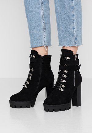 Enkellaarsjes met hoge hak - black