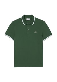 Zielona koszulka polo z bawełny o lekko fakturowanej powierzchni. Posiada kołnierzyk z dwoma guzikami, białe paski na rękawach oraz haftowane logo.