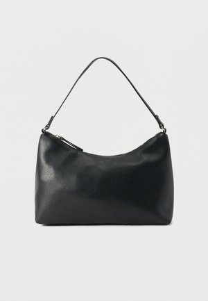 Black textured leather shoulder bag with curved top zipper and single adjustable strap against plain background.
