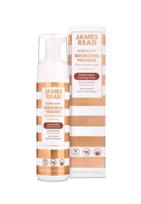 Bronzing-Mousse in einer weißen und goldgestreiften Pumpflasche. Mit Rosenduft und Inhaltsstoffen wie Aloe Vera und Grüntee-Extrakt. 200ml.
