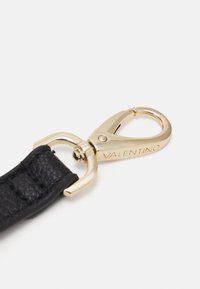 Black leather strap with a gold-tone metal lobster clasp. Features textured surface and engraved brand name "VALENTINO" on the hardware.
