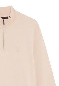 Felpa zip-up rosa pallido con collo alto, caratterizzata da un discreto logo ricamato sul lato sinistro del petto e una texture in tessuto morbida e liscia.