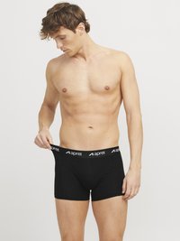 Schwarze Boxershorts aus dehnbarem Stoff mit einem weichen Bund, der das "aprel"-Logo zeigt. Bietet eine enganliegende Passform und eine glatte Textur.