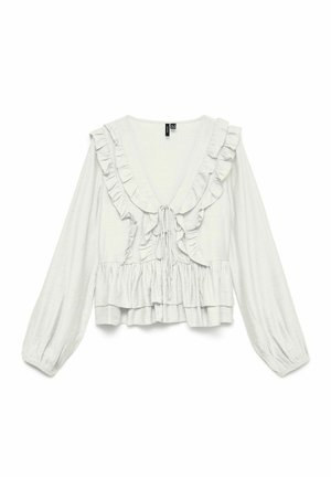 Bluza albă cu mâneci lungi, decolteu adânc în V, finisaj cu volane, închidere cu fundă în față și tiv cu volane suprapuse.