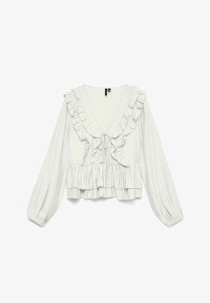 Bluza albă cu mâneci lungi, decolteu adânc în V, finisaj cu volane, închidere cu fundă în față și tiv cu volane suprapuse.