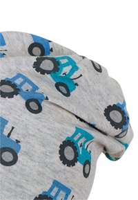 Gray fabric with a smooth texture featuring a repeated pattern of blue and black tractor illustrations with wheels.