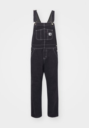 Black denim overalls with adjustable straps, a front pocket, and reinforced stitching. Features metal hardware and a relaxed fit design.