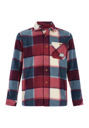 Chemise en flanelle à manches longues et à boutonnière, avec un grand motif à carreaux rouge, bleu et crème, dotée d'une poche poitrine avec un petit écusson logo.