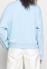 Weekday Mikina - light blue