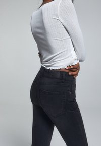 PULL&BEAR Flared Jeans - black