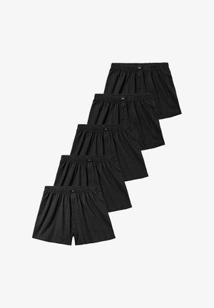 Schwarze Baumwoll-Boxershorts mit elastischem Bund, Knopfleiste und lockerer Passform, in einer gestapelten Anordnung von fünf Paaren präsentiert.