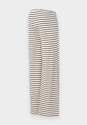 Gestreifte weit geschnittene Hose in Creme mit navyblauen horizontalen Streifen, aus einem weichen Stoff und mit einem elastischen Bund für zusätzlichen Komfort.