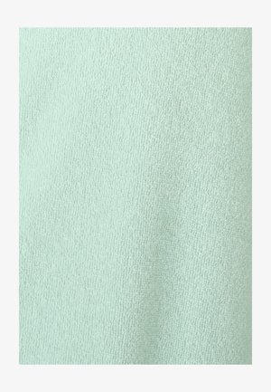 Tessuto verde menta chiaro con una superficie morbida e testurizzata e una fine trama pelosa, adatto per abbigliamento o tessuti per la casa.