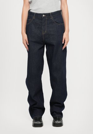 Dark blue denim jeans with a relaxed fit, featuring golden stitching, five pockets, and a button closure at the waist.