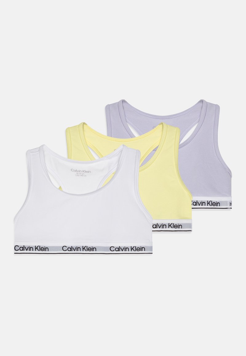 Tri bralette u bijeloj, žutoj i lavandi boji. Svaki ima dizajn s racerbackom i crni pojas s "Calvin Klein" logotipom. Mekani pamučni materijal.