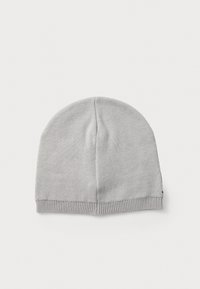 Gray knit beanie hat with a ribbed brim, soft texture, rounded top, and subtle seam detailing. Simple design, suitable for various outfits.