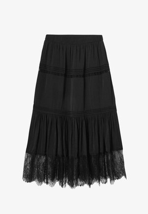 Jupe noire mi-longue aux genoux avec un design à volants superposés, ornée d'une bordure en dentelle à l'ourlet et d'une taille élastique pour un ajustement confortable.