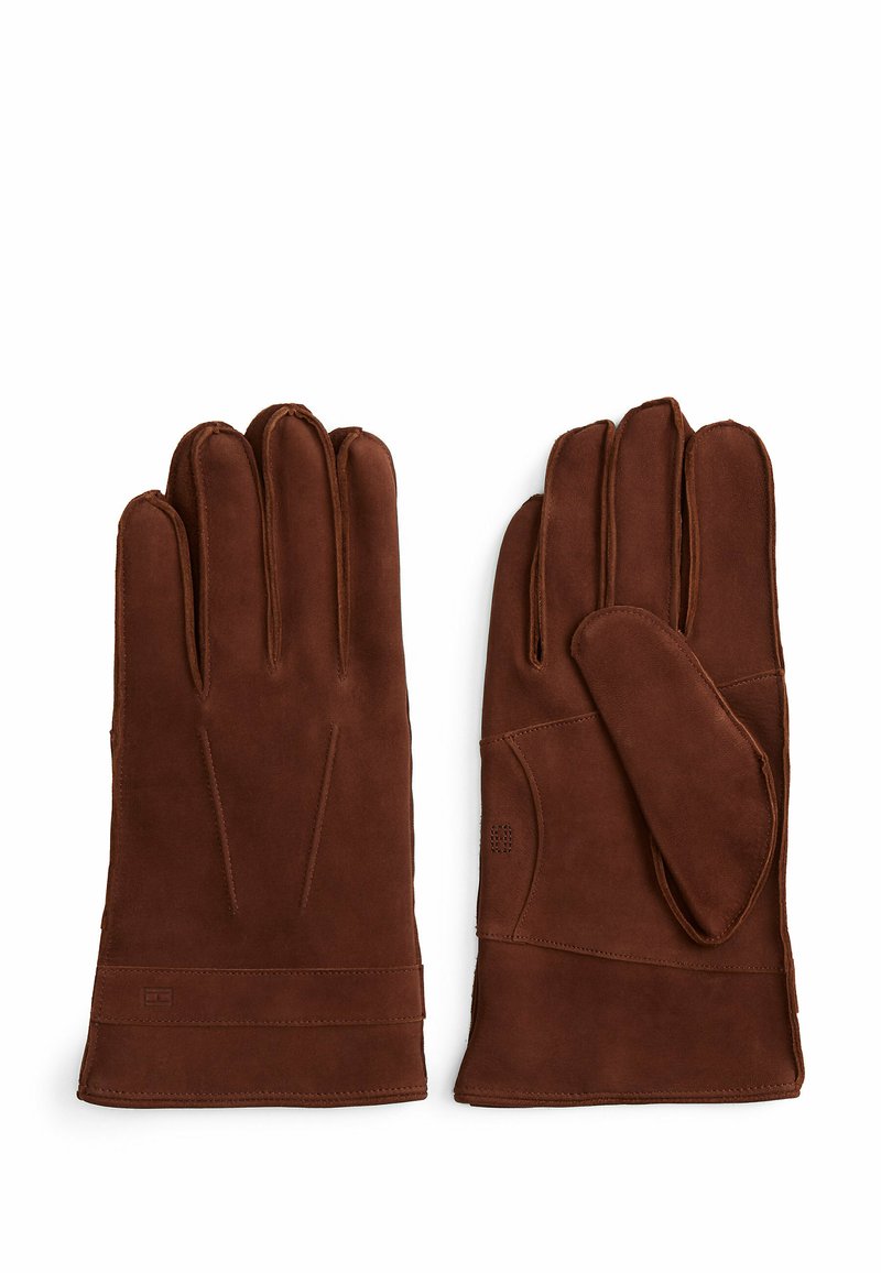 Brown leather gloves with a smooth texture, featuring a four-finger design, contrasting stitching, and a subtle embossed logo detail.