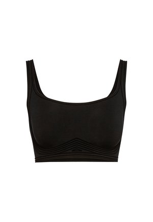 Soutien-gorge de sport noir en tissu doux et extensible, avec de larges bretelles et des accents côtelés sur le buste pour plus de texture et de soutien.
