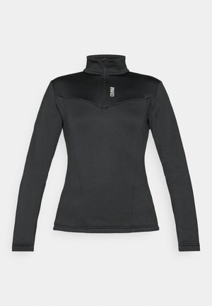 Musthave musta pika varrukaga termopluus kõrge kaeluse ja osalise viiliga, millel on keha vastav disain ja kaarekujuline õmbluste detail õlgadel.
