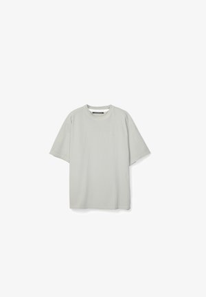 Light gray, short-sleeve, crew neck T-shirt with loose fit, displayed against a white background.