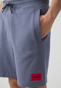 HUGO DIZ - Pantaloni de trening - open blue