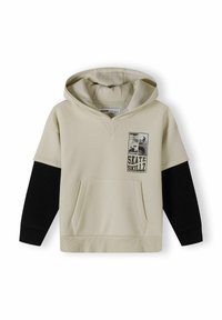 Beige hoodie med en känguruficka, korta ärmar och svarta långa ärmar. Har en grafik med texten "SKATE SKILLZ" och en huva.
