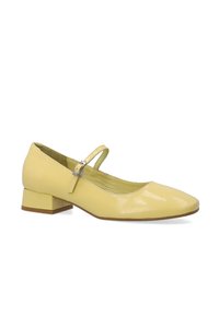 Gelbe Lackleder-Mary-Jane-Schuhe mit quadrater Zehenform, verstellbarem Riemen und niedrigem Blockabsatz. Strukturierte Innenauskleidung.