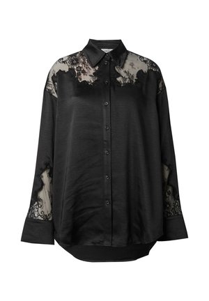 Schwarze Hemdbluse mit transparenten Spitzenverzierungen an Schultern und Ärmeln. Weicher Stoff mit lockerer Passform und abgerundetem Saum.
