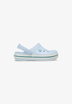 Light blue clog made of synthetic material with ventilation holes, a soft strap, and a speckled white sole featuring a teal stripe.