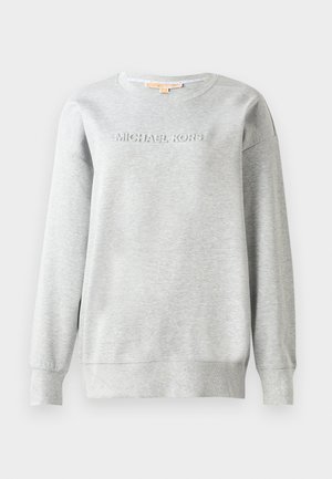 Felpa grigia realizzata in morbido tessuto, con scollatura a girocollo, maniche lunghe e logo in rilievo "MICHAEL KORS" sul davanti.