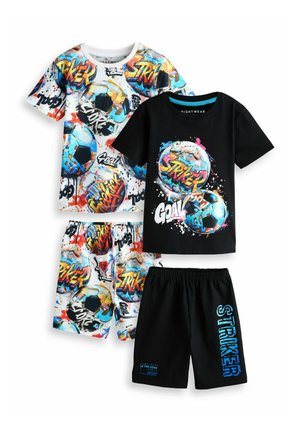 Two pairs of kids' matching soccer-themed pajamas with graphic tees and shorts, featuring colorful soccer balls and "Striker" text.