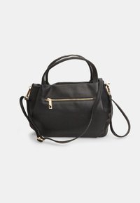 Black leather handbag with two short handles, a detachable shoulder strap, and a front zip pocket. Textured surface with gold-tone hardware.