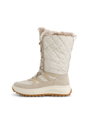 Botte d'hiver beige matelassée avec doublure en fourrure, devant lacé et semelle en caoutchouc épaisse avec des crampons profonds pour une meilleure traction.