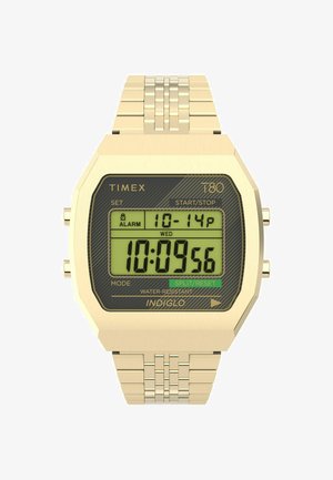 Digital Timex T80 ur med armbånd i guldfarvet rustfrit stål, oktagonal bezel, sort urskive og grøn baggrundsbelyst skærmfunktion.