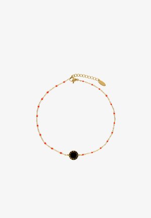 Delikatna złota bransoletka z łańcuszkiem, małymi czerwonymi koralikami oraz centralnym okrągłym czarnym zawieszką z złotymi rzymskimi cyframi, z regulowanym zapięciem.