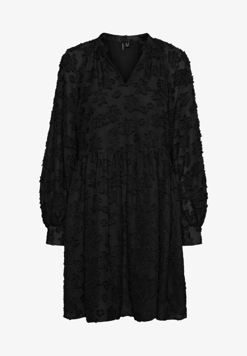 Robe noire à manches longues, avec une taille froncée et une broderie florale texturée sur toute la surface. Encolure en V avec de légers volants.
