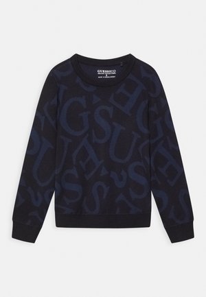 Mørk marineblå langærmet sweater med store, diskrete navybogstaver, der danner et mønster, rund hals og ribstrikkede ærmegab og kant.