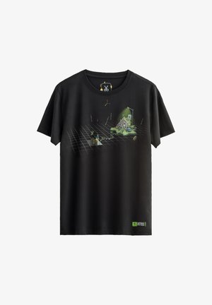 Zwarte katoenen t-shirt met een graphic van een kleurrijk huis op een rasterpatroon, met details zoals een lamp en een slangontwerp.