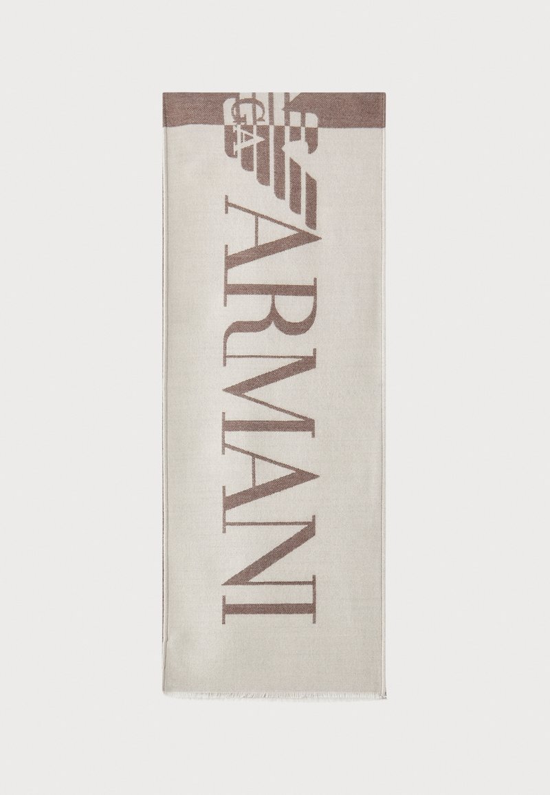 Beige tekstiil sall, millel on suur pruun "ARMANI" logo ja kotka embleem vertikaalselt. 
