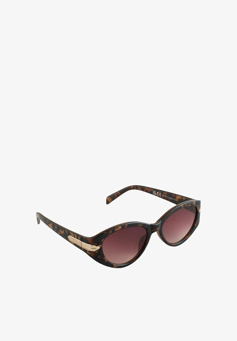 Saulesbrilles ar ķirzakas rakstu, kaķacu formu, gradienta lēcām un metāla akcentu uz briļļu kājiņām. Gluda plastmasas materiāla.