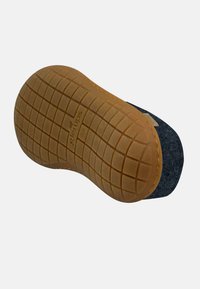 Gray felt shoe with a textured brown rubber sole. The sole features a diamond pattern for grip and a soft rounded toe design.