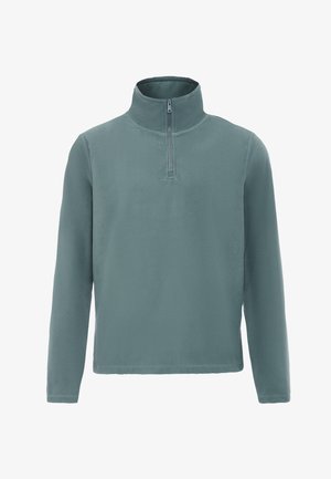 Puhafleece pulóver lágy teal színben, félcipzáros elülső résszel, állógallérral, hosszú ujakkal és bolyhos textúrával a melegség érdekében.