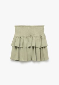 Jupe mini smockée en vert pâle, avec un design à volants en niveaux, texture douce et taille élastique.