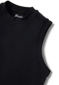 Black sleeveless crewneck top with visible neckline stitching and "Utopia" label inside collar.