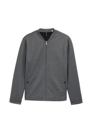 Grijze jas met rits, ronde kraag, twee steekzakken aan de zijkant en een gladde textuur. Heeft een minimalistisch ontwerp en een aansluitende pasvorm.